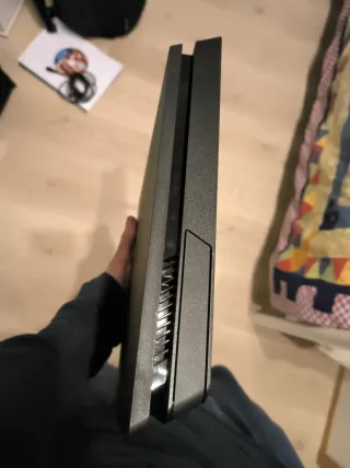 PS4 Slim + GTA 5 disco y más juegos