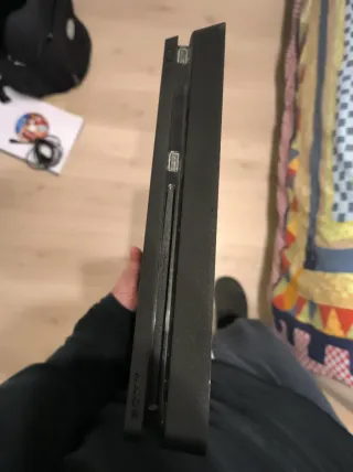 PS4 Slim + GTA 5 disco y más juegos