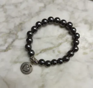 Par de pulseras negra y roja