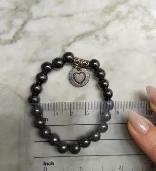 Par de pulseras negra y roja