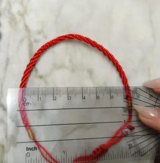 Par de pulseras negra y roja