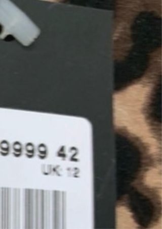 Vestido manga larga animal print. Talla 42