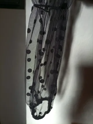 Top corsetto con maniche a pois