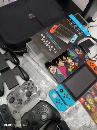 Nintendo Switch + Accesorios y Juegos