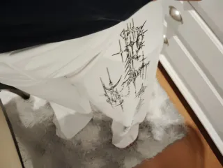 Pantalones anchos blancos con estampado