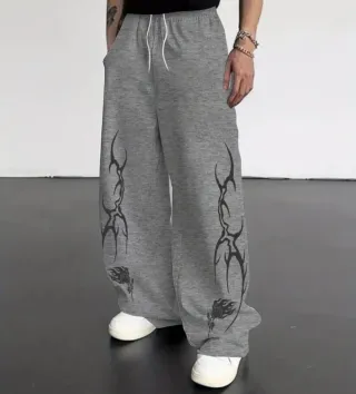 Pantalones anchos grises con diseño tribal