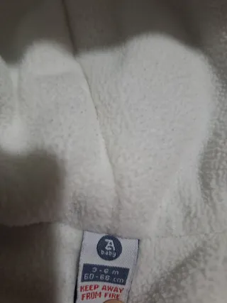 Buzo azul para bebé con capucha