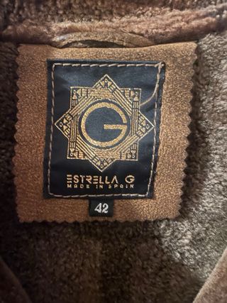 Parka larga piel mutón con capucha. Piel int./ext.