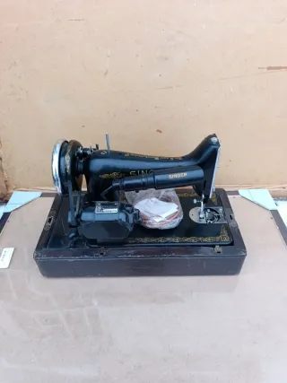 Máquina de coser Singer portátil con motor