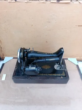 Máquina de coser Singer portátil con motor