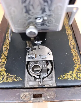 Máquina de coser Singer portátil con motor