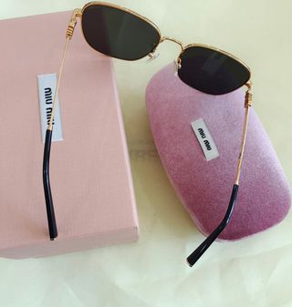 Gafas de sol Miu Miu rosas y blancas