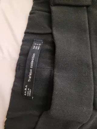 Pantaloni neri con banda laterale