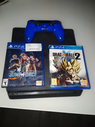 PS4 con 2 juegos y mando azul En perfectas condici