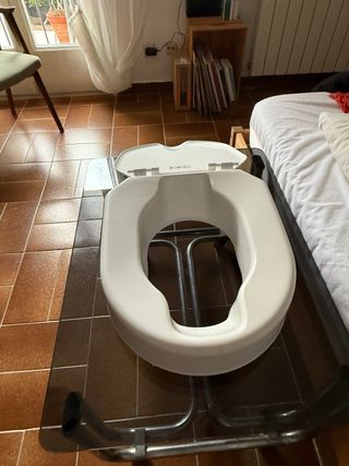 Alzador para taza de baño