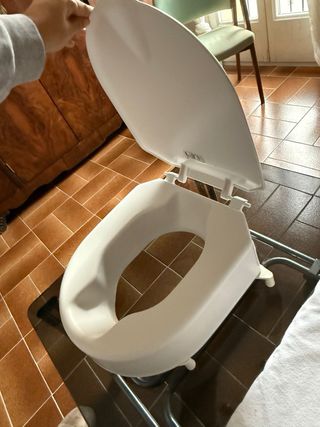 Alzador para taza de baño