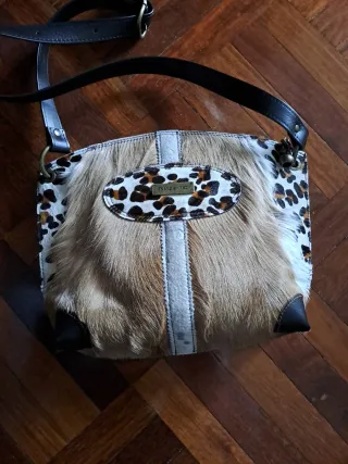 Bolso piel y estampado animal