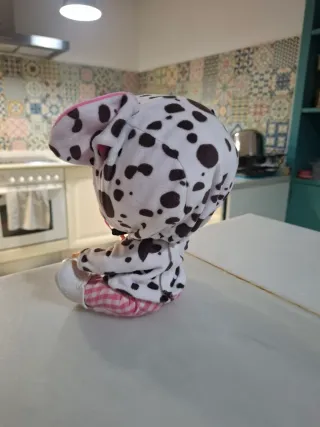 Bebé Llorón con chupete y traje de vaca