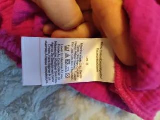 Top DKNY una manga color rosa