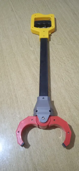 Raccoglitore giocattolo con pinza