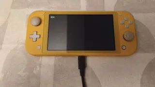 Nintendo Switch Lite Amarilla + Accesorios