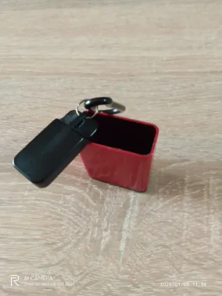 Llavero metálico para monedas