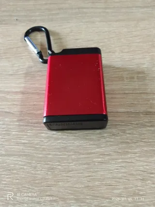 Llavero metálico para monedas