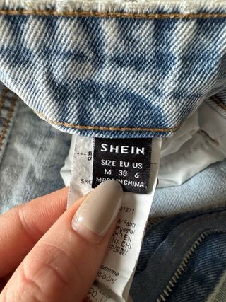 Pantaloncini jeans strappati chiari