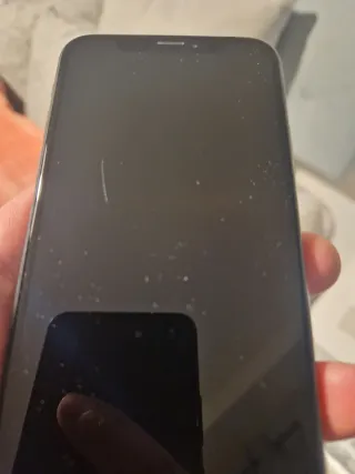 iPhone X 64GB 86% batería, pantalla con raya