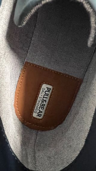 Botas de hombre azul y marrón