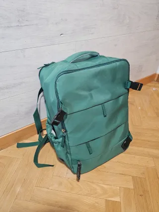 Mochila de mano avión, verde.