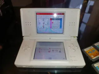 Nintendo DS Lite Blanca + 4 Juegos