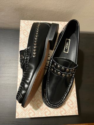 Mocassini neri con borchie