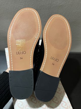 Mocassini neri con borchie