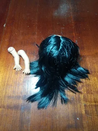 Cabeza y brazos muñeca Lesly mulata