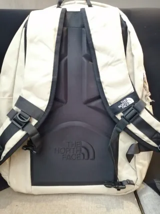 Mochila The North Face beige con monedero
