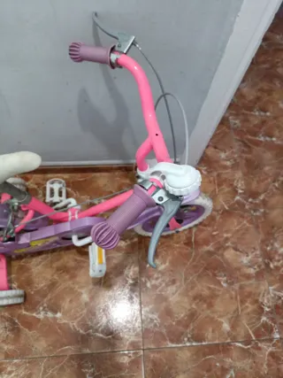 Bicicleta infantil rosa y morada negociables