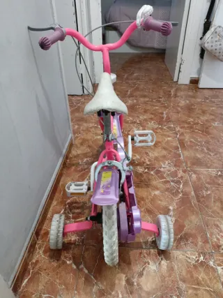Bicicleta infantil rosa y morada negociables