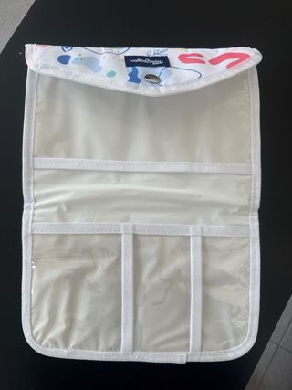 Cambiador y portadocumentos de viaje