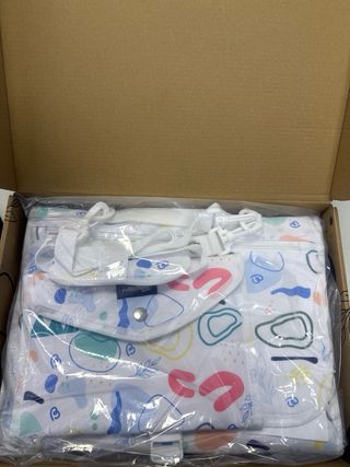 Cambiador y portadocumentos de viaje