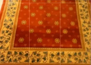 Alfombra sintética con cenefa decorativa