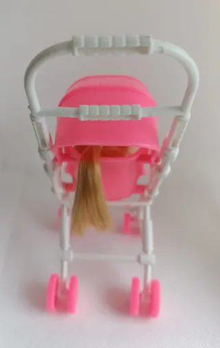 Lote muñecas, carrito y bici