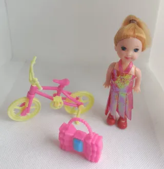 Lote muñecas, carrito y bici