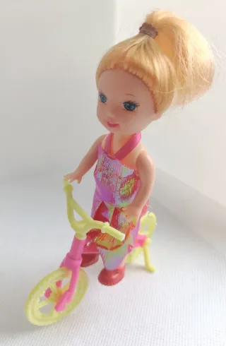 Lote muñecas, carrito y bici