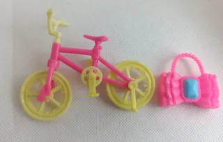 Lote muñecas, carrito y bici
