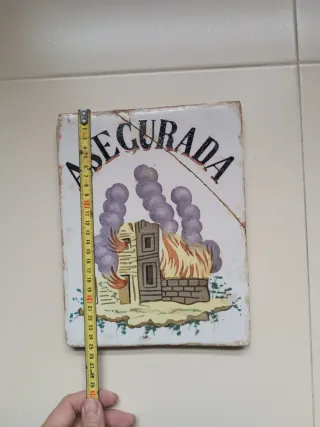 Azulejo antiguo Asegurada primer modelo
