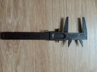 Calibre de hierro forjado antiguo