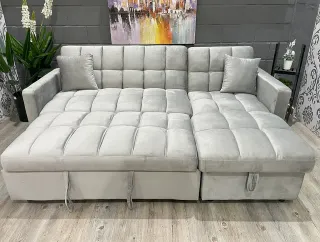 Sofá modular gris con chaise longue