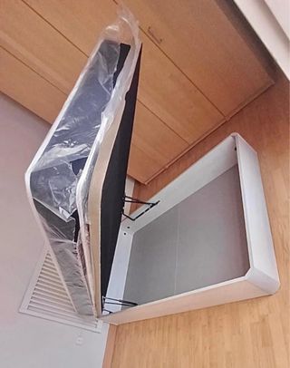 Cama individual con cabecero