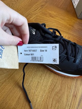 Zapatillas pádel/tenis Asics negras y naranjas